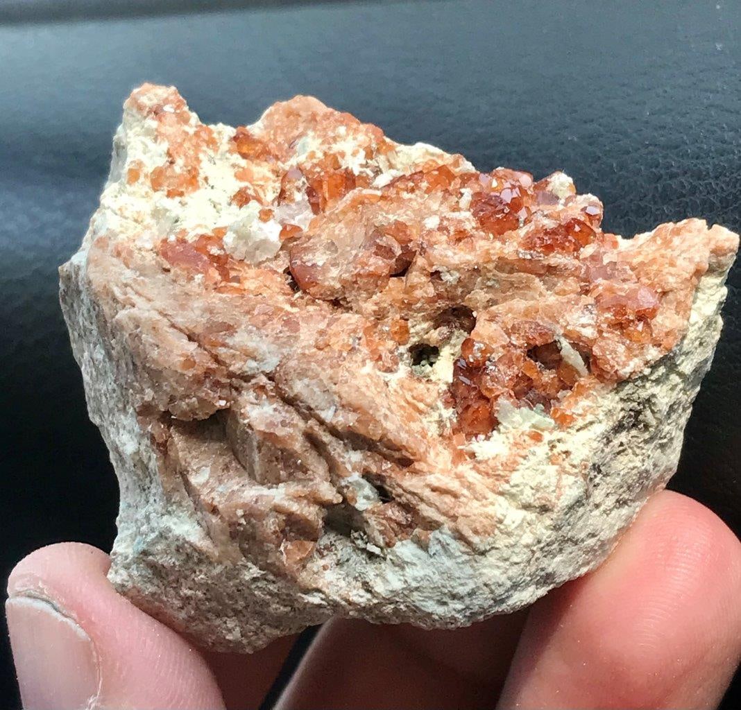 73 GRAMS Spessartite Garnet Mineral SPECIMEN 52X38X27 mm: 73 GRAMS Spessartite Garnet Mineral SPECIMEN 52X38X27 mmShipping Rate: 23$ shipping rates are determined by Parcel weight and destination.Combined shipping: We offer combine shipping on multiple items