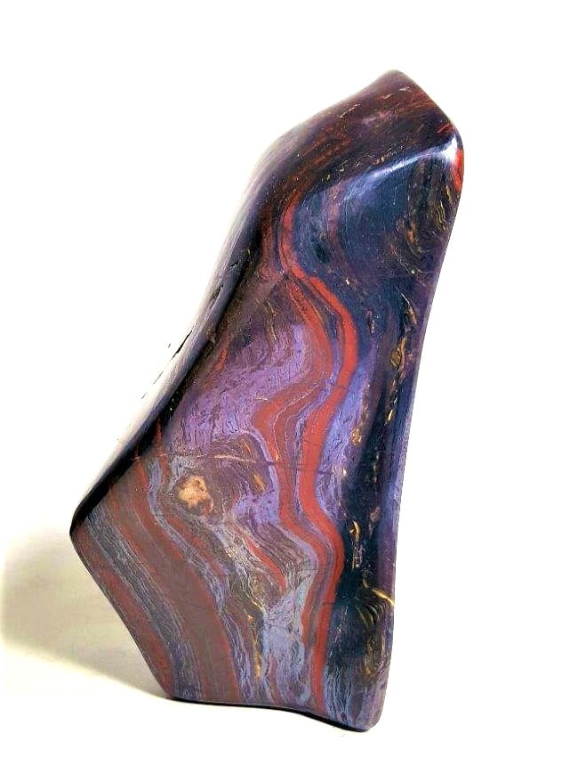 Tiger eye Tumbled Stone - 557.8 Grams: Tiger eye Tumbled Stone - 557.8 Grams - 139X72X42 mmShipping Rate: $50.00 .shipping rates are determined by Parcel weight and destination.Combined shipping: We offer combine shipping on multiple items