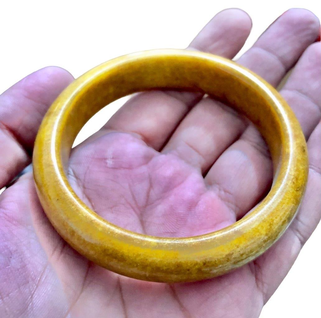 Yellow Dyed Bangle Onyx Stone: Yellow Dyed Bangle Onyx StoneShipping Rate: $23.00 .shipping rates are determined by Parcel weight and destination.Combined shipping: We offer combine shipping on multiple items purchased to reduce sh