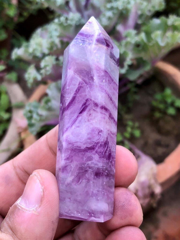 120g Candy Fluorite Crystal Tower ? 9 cm Polished Point, Rainbow Fluorite Obelisk Healing Stone: Add a vibrant touch to your collection with this Candy Fluorite Crystal Tower, a beautifully polished point featuring soft, colorful hues reminiscent of pastel candy tones. Showcasing natural bands of