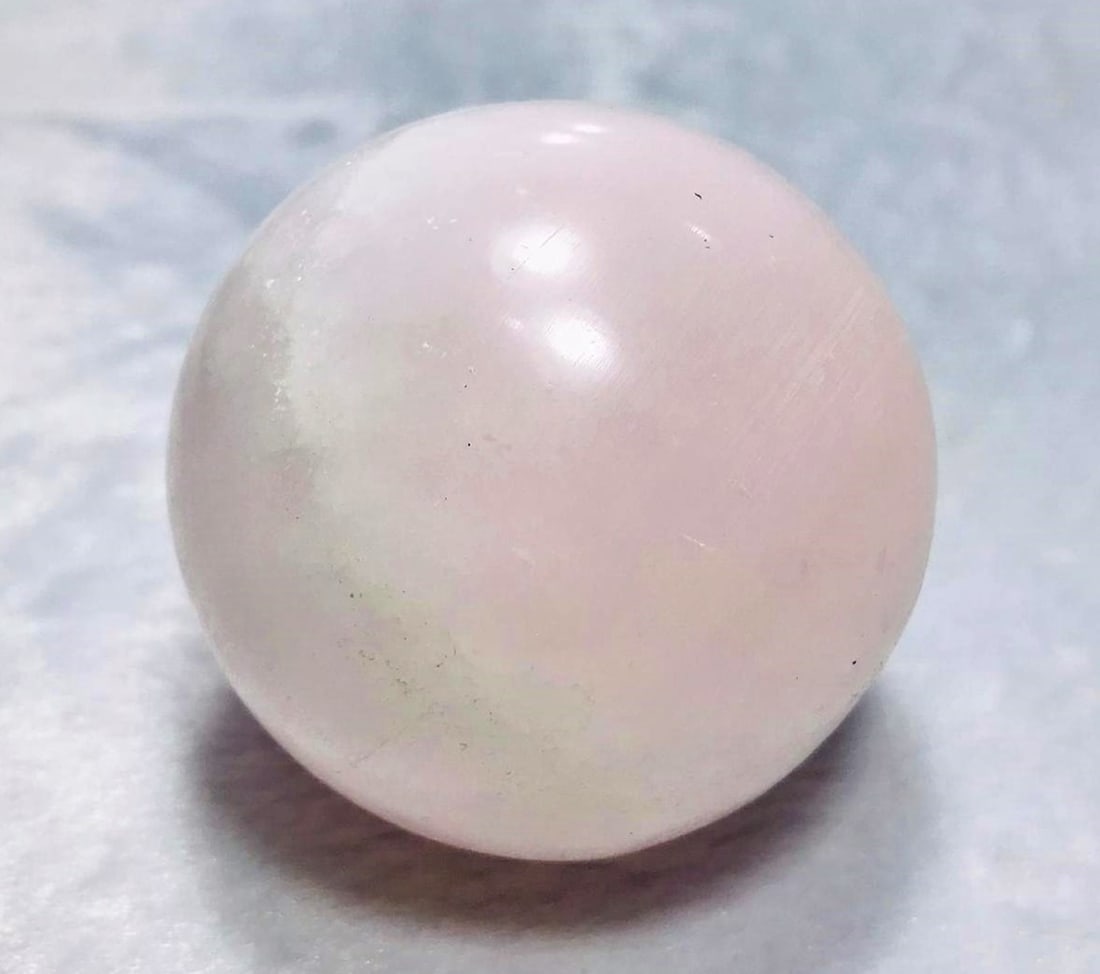 Pink Calcite Sphere - 348G: Pink Calcite Sphere - 348G - 62mmShipping Rate: $45.00 .shipping rates are determined by Parcel weight and destination.Combined shipping: We offer combine shipping on multiple items purchased to reduc