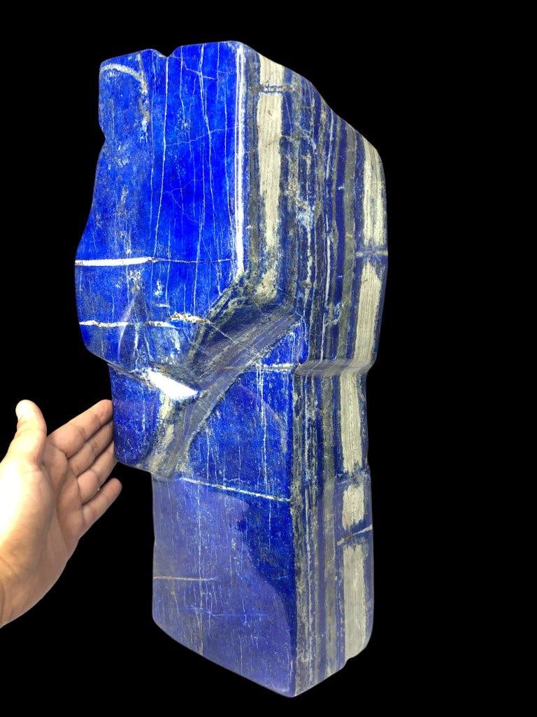 21 Kg Top Quality Natural Lapis Lazuli Standing Tumble ? Large Polished Blue Gemstone Decor Piece: Impressive 21 kg top quality natural Lapis Lazuli standing tumble featuring deep royal blue color with golden pyrite flecks and a smooth polished finish. This large statement piece is perfect for luxu