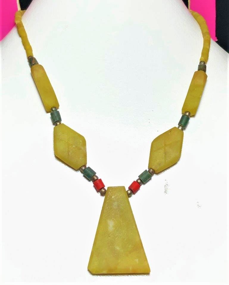 Natural Jade Gemstone Necklace: Natural Jade Gemstone Necklace Shipping: $23.00. Shipping rates are determined by Parcel weight and destination.