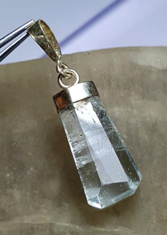 Stunning, Aquamarine Pendant: Stunning, Aquamarine March Birthstone Necklace Pendant - 21X11X9 mm Shipping: $23.00. Shipping rates are determined by Parcel weight and destination.