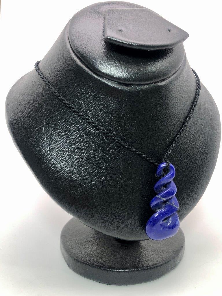 Hand-Carved Lapis Lazuli Pendant in Silver Natural Gemstone Jewelry: Discover the timeless beauty of this hand-carved natural Lapis Lazuli pendant, beautifully set in silver. Featuring rich blue tones and natural mineral character, this pendant combines the elegance of