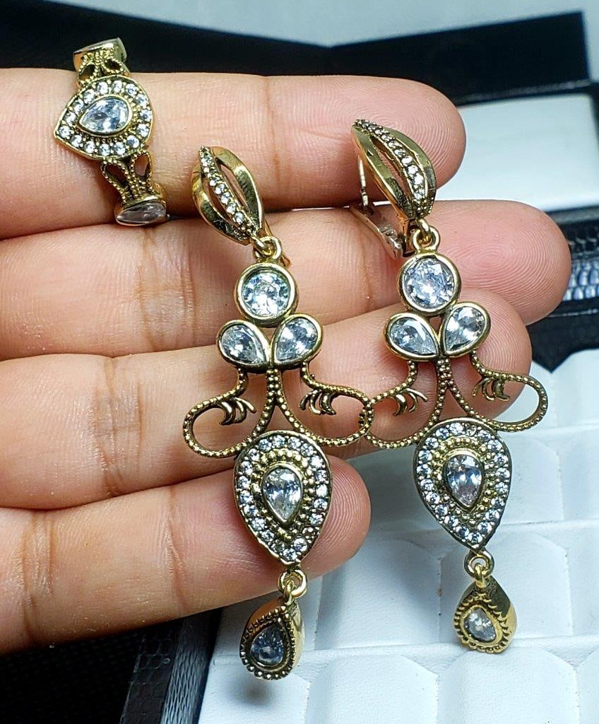 Mossonite Stone Earrings and Ring Set: Bronze Turkish Jewelry - Mossonite Stone Earrings and Ring Set FREE SHIPPING Shipping rates are determined by Parcel weight and destination.