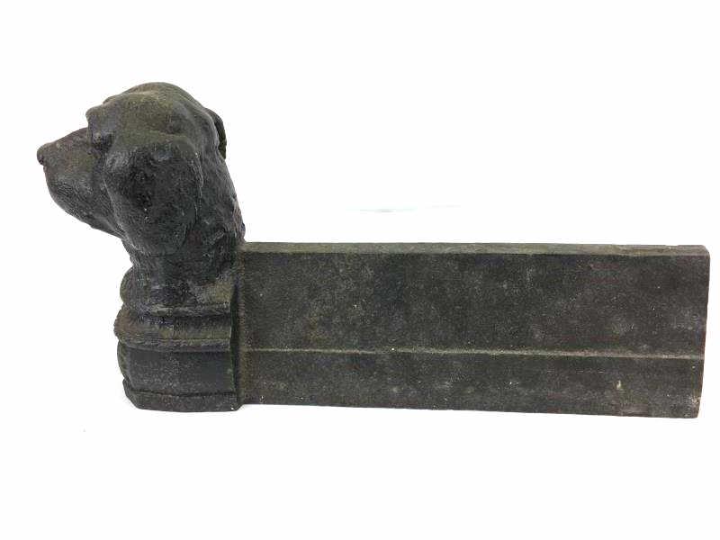 Cast iron Dog Head Fireplace Andiron: Cast iron dog head, 13" l x 3 1/2" h, from back of dog head to end measures 3 1/2" w x 7" hOnly one available