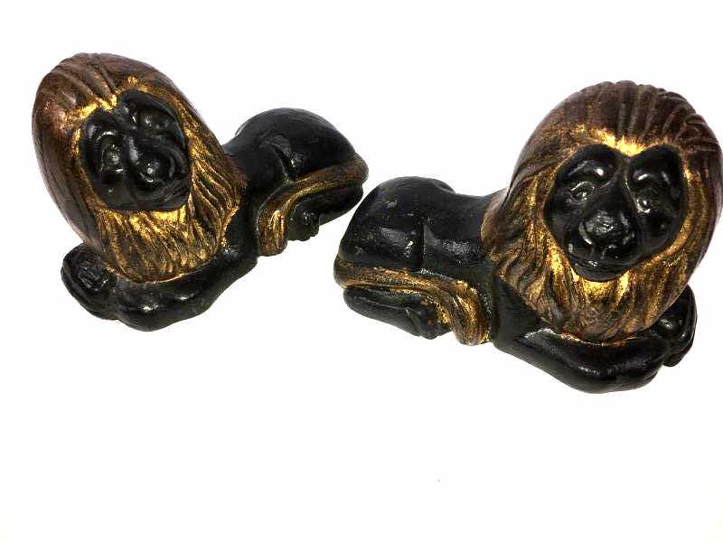 Pair of Small Lion Bookends: 2 small lion statues, reclining, painted black with gold painted mane and tail, minor paint loss, cast iron, 4 1/2" h x 7" l