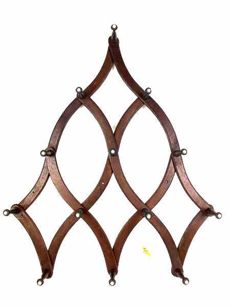 Folding Hat Rack: Folding Wall Hat Rack, 13 pegs, 13 porcelain knobs, 3 holes for hanging, 1 knob cut off, piece missing on back, folded measures 38" l x 7"