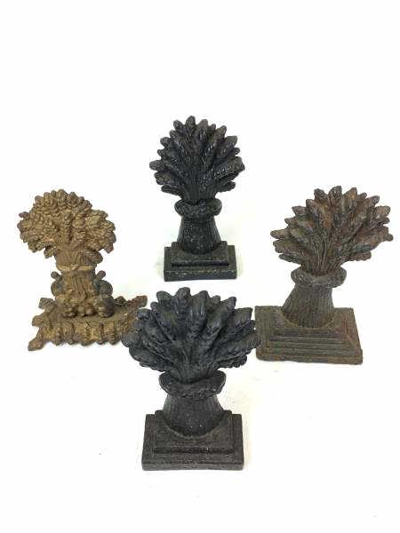 4 Sheaves of Wheat Door stoppers: 4 Decorative Cast Iron Door Stops, sheaves of wheat, various heights, rusted, largest is 7 1/2" h