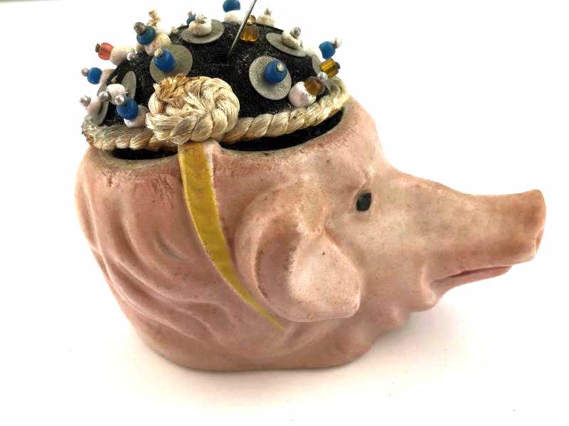Pig Head Pin Cushion: Pig Head china pin cushion, with straight pins, some paint loss and wear, 2 3/4" x 5" l