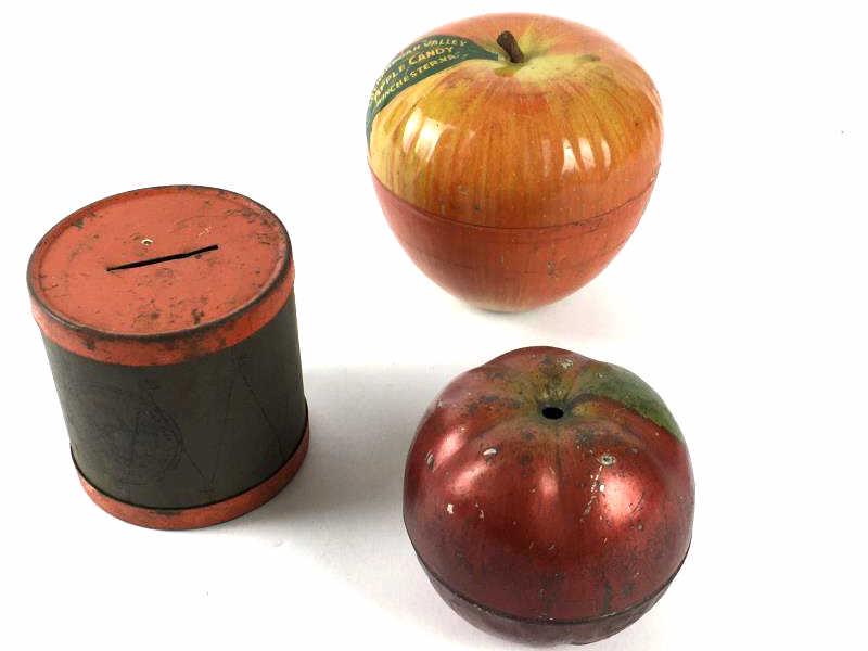 3 Tin Toys: 3 Tin Toys- 2 apples and drum bank, Apple leaf says "Shenandoah Valley, Apple Candy, Winchester, VA", stem is loose, marked Wyandotte Toys, made in USA, 3 1/2" h, tin apple with missing stem, stamped