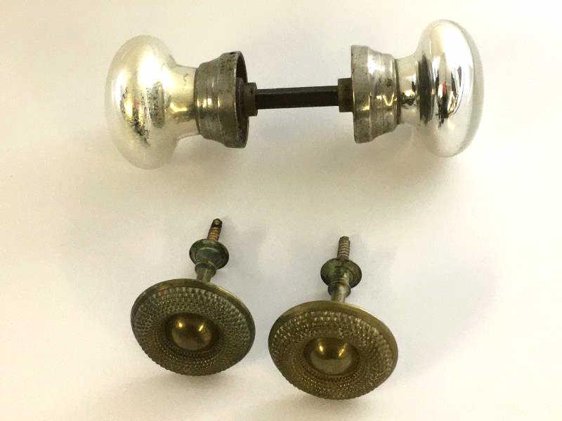 2 Brass curtain tie backs and mercury door handle: Lot - Mercury glass double ended door handle, one end is tarnished and 2 brass curtain tie backs, 2" dia