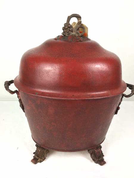 Decorative Covered Metal Container painted red: Covered Metal Container, painted red, decorative feet, handles and top knot, 15 1/2" x 12" x 22" h