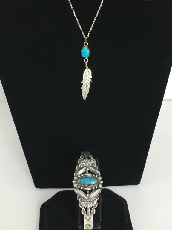 Turquoise Feather Necklace & Cuff Bracelet: 18" feather with oval turquoise pendant on fine rope chain and 1 sterling turquoise center marquise stone cuff bracelet, 6" dam on back support, 22.4 g