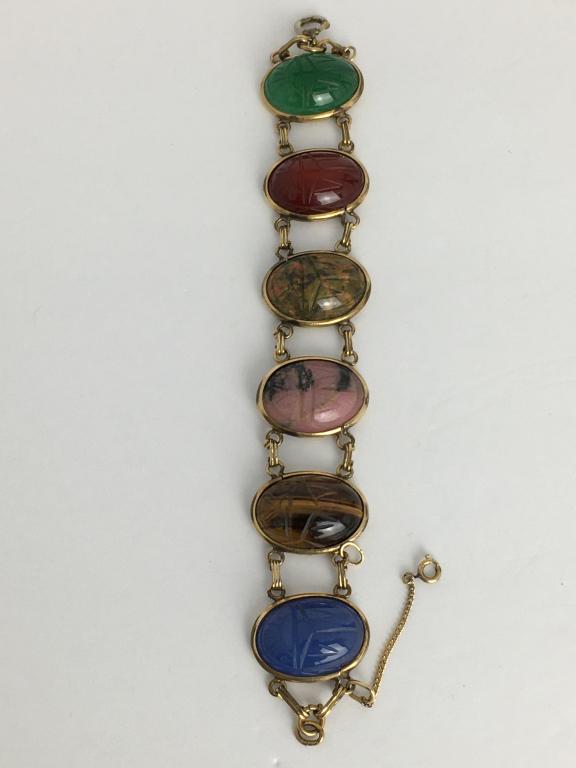 Scarab Bracelet: 6 scarabs, multi colors, each scarab measures 23.75 x 16 mm, double link chain, safety chain, overall 7"