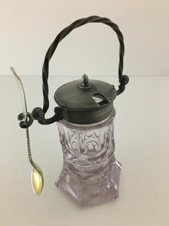 Salt Stein with sterling spoon: tall clear glass salt with pewter top, bail handle with side spoon holder, 2" hexagonal base with thumbprint pattern, 5 1/2" l, spoon is tested sterling, 3 1/2" l, hallmark lion, anchor and G, gold wa