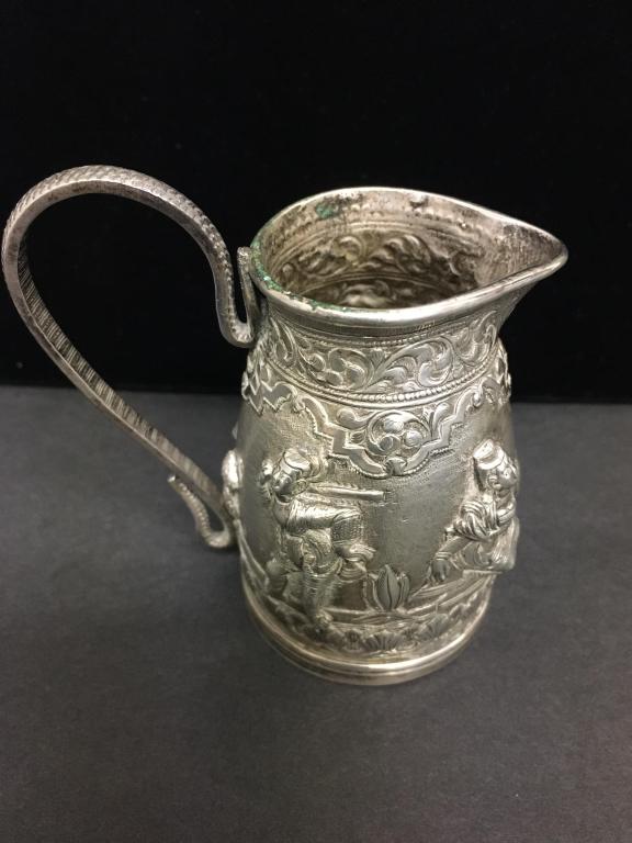 Siam Silver Pitcher: 800 silver,(tested Sterling) early 20th century, 4 full-body figures, 3 1/2" h x 2" d good condition, 107 g