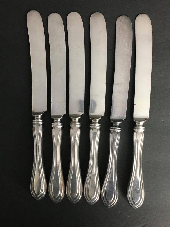 6 Sterling Handled Dinner Knives: Holmes & Edwards, 4 1/2" sterling hollow handle, 10" overall rust on knife blades
