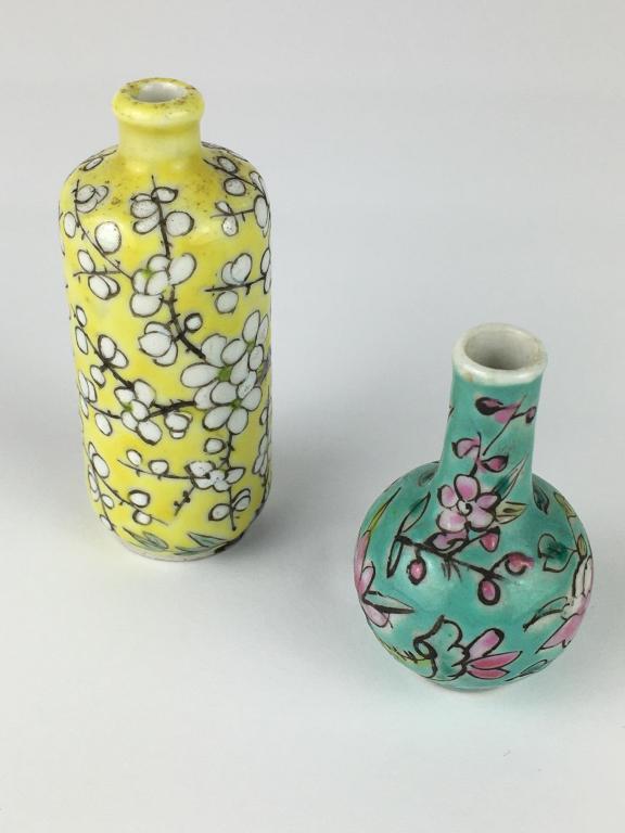 2 Chinese Snuff Bottles: yellow and white floral, 2 3/4" h x 1" dia and green and pink floral marked China, good condition, 2" h x 3/4" dia