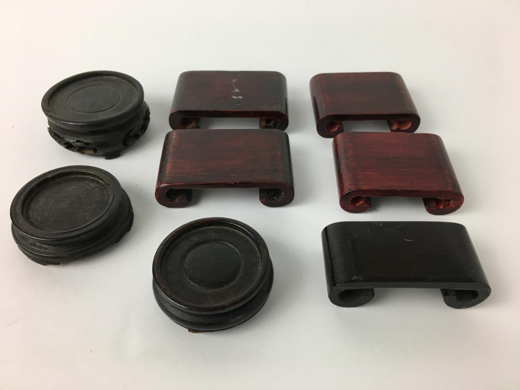 8 Mini Teakwood Stands: 3 round are 1 1/2" dia and 5 rectangular, 1 3/4 - 2" x 1" - 1 1/4" good condition