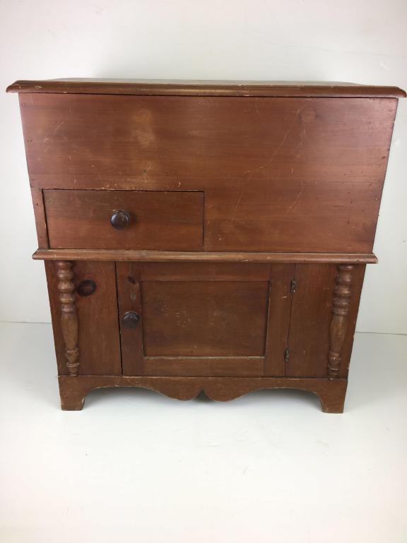 Pine Lift Top Commode: one side drawer, lower cupboard, half spool columns on each side, cut out base, yellow interior, 28 3/4" w x 17" d x 29" h scratches, ring marks, front left cracks, crayon marks in drawers