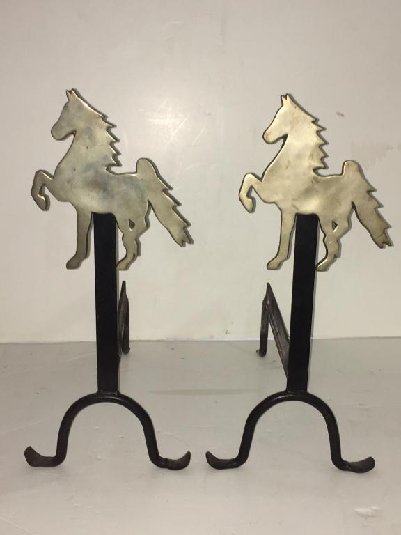 Prancing Horse Andirons: modern with wrought iron base with curled feet, horses measure 9" l x 9 3/4" h, 16" cast iron base, 23" h minor rust on horses