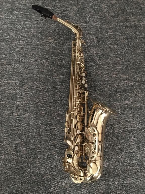 Allora Alto Saxophone: serial # 1307001, scroll work, 24" x 11" x 5 1/4" x 27" overall, matching allora hard case good condition, 10 lbs