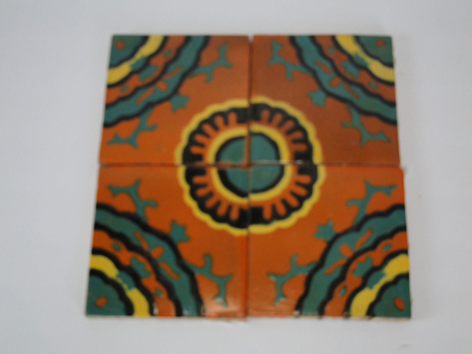 4 Sunburst Mexican Tiles: interchangeable pattern, incised on back "Taylor"