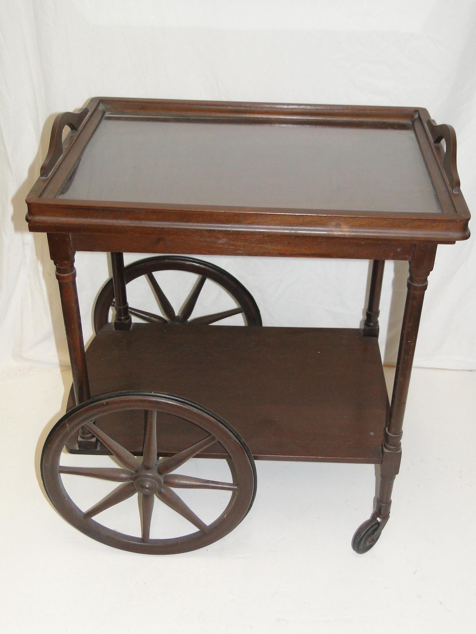 Mahogany Tea Cart: with glass removeable tray, lower shelf, 2 large wheels and 2 small wheels