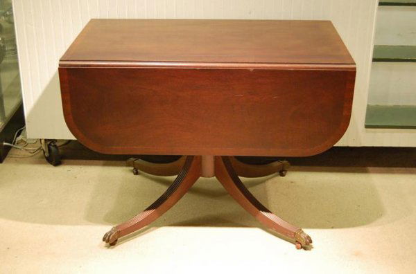 DUNCAN PHYFE STYLE TABLE: Mahogany Duncan Phyfe style Drop Leaf Table with Banded Top with two drawers - 29" tall, 39" wide, 24" closed, 50" open