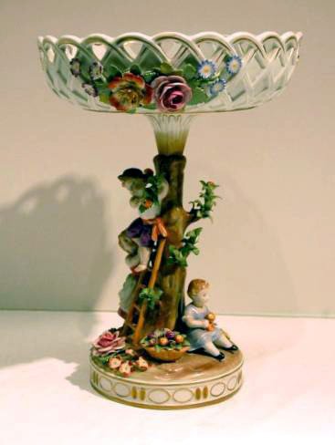 GERMAN PORCELAIN FIGURAL COMPOTE W/ APPLIED FLOWER