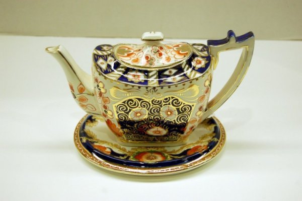Gaudy Decorated English Teapot & Matching Trivet - t: Gaudy Decorated English Teapot & Matching Trivet - teapot has ageline in bottom - 5" tall - 9 1/2 spout to handle