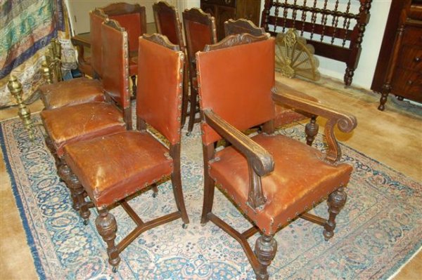 Set of Eight Oak Gothic Style Dining Chairs: Set of Eight Oak Gothic Style Dining Chairs w/ Acanthus Leaf Carvings & Stretcher Base - Leather Upholstery - Two (2) arms - 41 1/2" T x 22" across arms x 19 1/2" D - 21 1/2" seat to floor