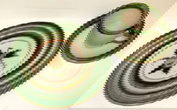 Set of John B. Taylor Pottery Dinnerware: Set of John B. Taylor Pottery Dinnerware,Harvest pattern consisting of 8 dinner plates, 7 luncheon plates, 10 salad plates, 5 bread & butter plates, 7 cov. ramekins, 6 extra lids, 8 plain cups, 3 deco