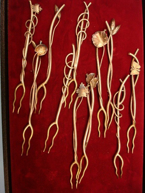 Eleven Sterling Oyster Forks signed with a fleur : Eleven Sterling Oyster Forks signed with a fleur de lis (possibly Davis & Galt), Aesthetic style with twig handles having applied leaves, butterflies & seed pods, gilt tines - 6" long - slight variati