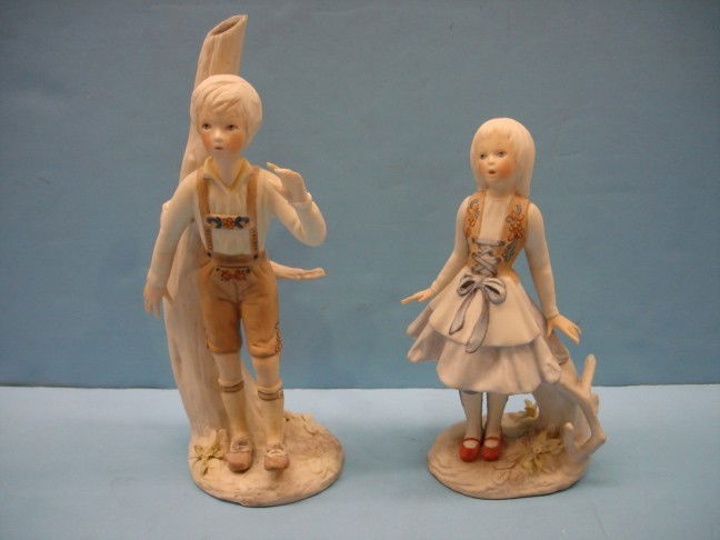 Pair of Cybis Figurines - Hansel & Gretel: Pair of Cybis Figurines - Hansel & Gretel - very good condition - 1 tiny chip th leaf on base of girl - 9" x 7" T
