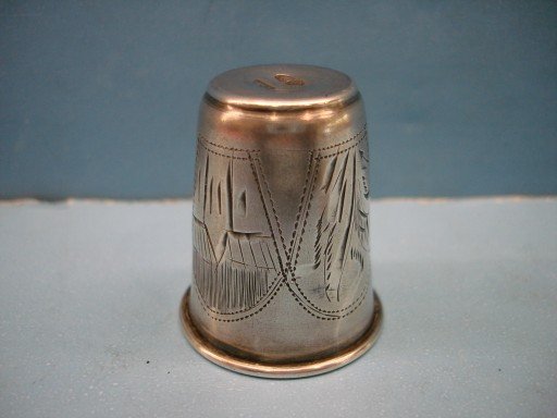 Engraved European Silver Thimble Motif Measure: Engraved European Silver Thimble Motif Measure Marked wuth Bust of Man & 84 - HE3 - 1 1/2" tall, 1 1/4" dia.