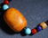 AN ANCIENT CHINESE AMBER CARVED NECKLACE - 2