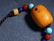 AN ANCIENT CHINESE AMBER CARVED NECKLACE - 4