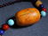 AN ANCIENT CHINESE AMBER CARVED NECKLACE - 5