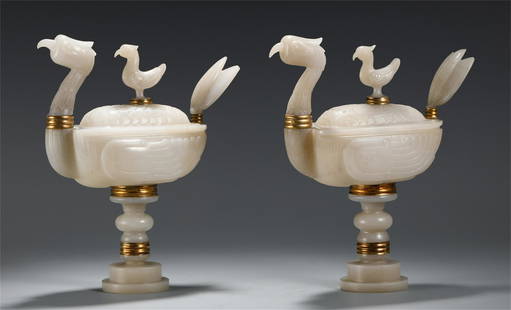 A PAIR OF CHINESE JADE CARVED BIRD SHAPED TABLE ITEM: H. 21.5 cm. L. 17.7 cm. W. 7.1 cm.