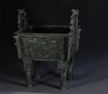 CHINESE ANCIENT BRONZE DOUBLE HANDLE FOUR FOOT CENSER: L. 38.5 cm. W. 27.5 cm. H. 47.5 cm.