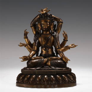 CHINESE GILT BRONZE OF EIGHT ARMS BUDDHA STATUE: H. 22 cm. W. 17.2 cm. T. 12.2 cm.