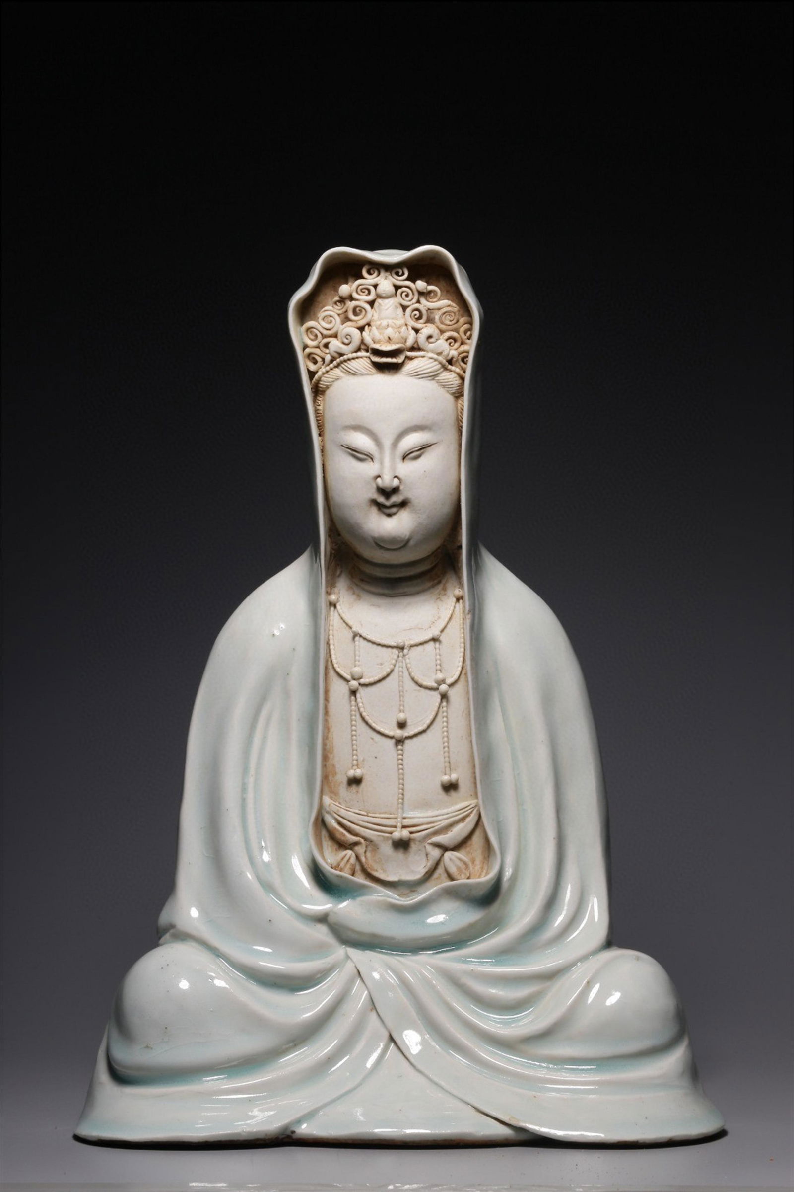 A Chinese Hutian-Type Glazed Porcelain Figure of Buddha (1 of 9)
