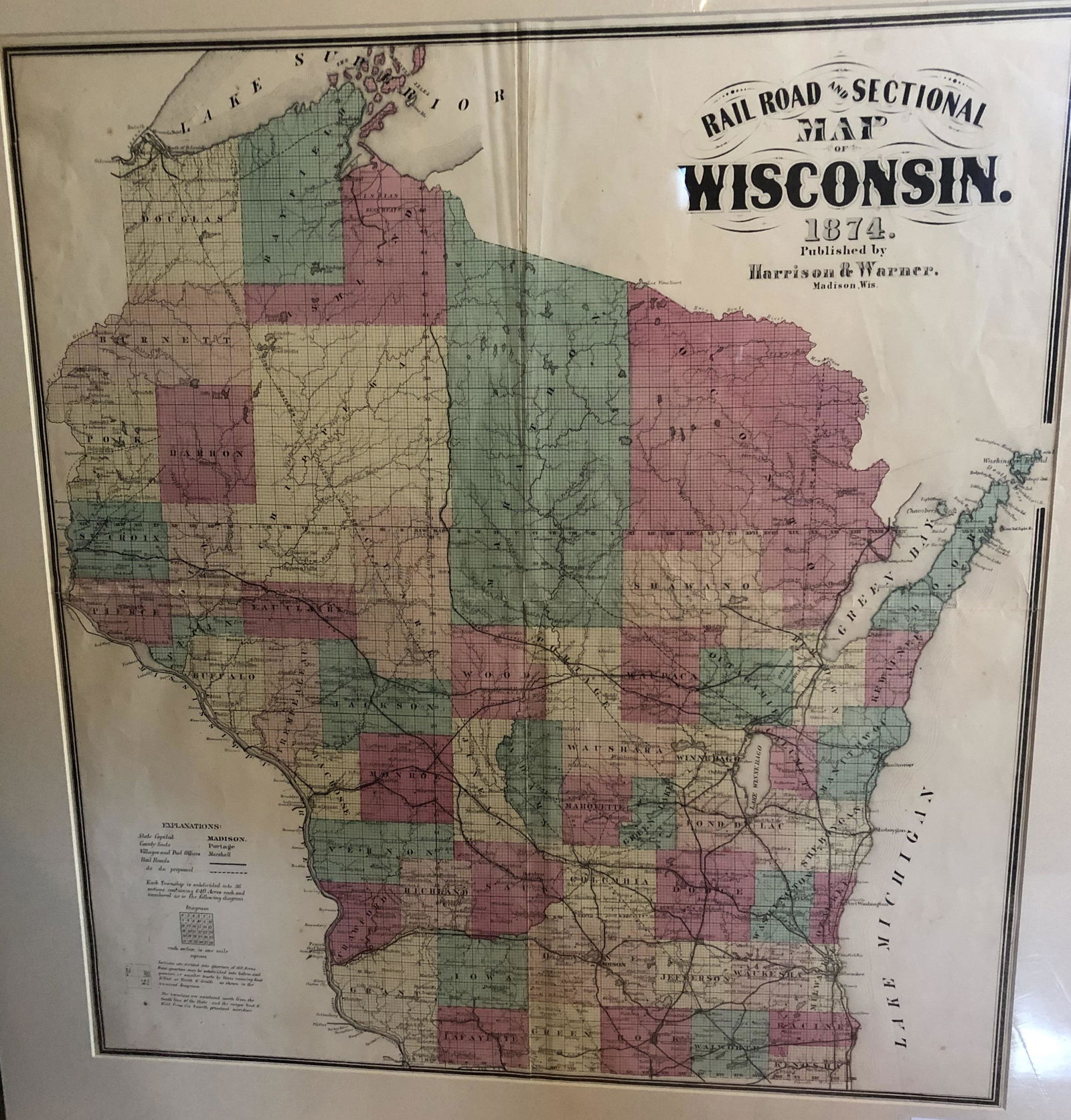 1874 Wisconsin Railroad & Sectional Map: By Harrison & Warner of Madison, WI. 25" x 26-1/2" map with 33"x 31"Matted & Ready to frame.