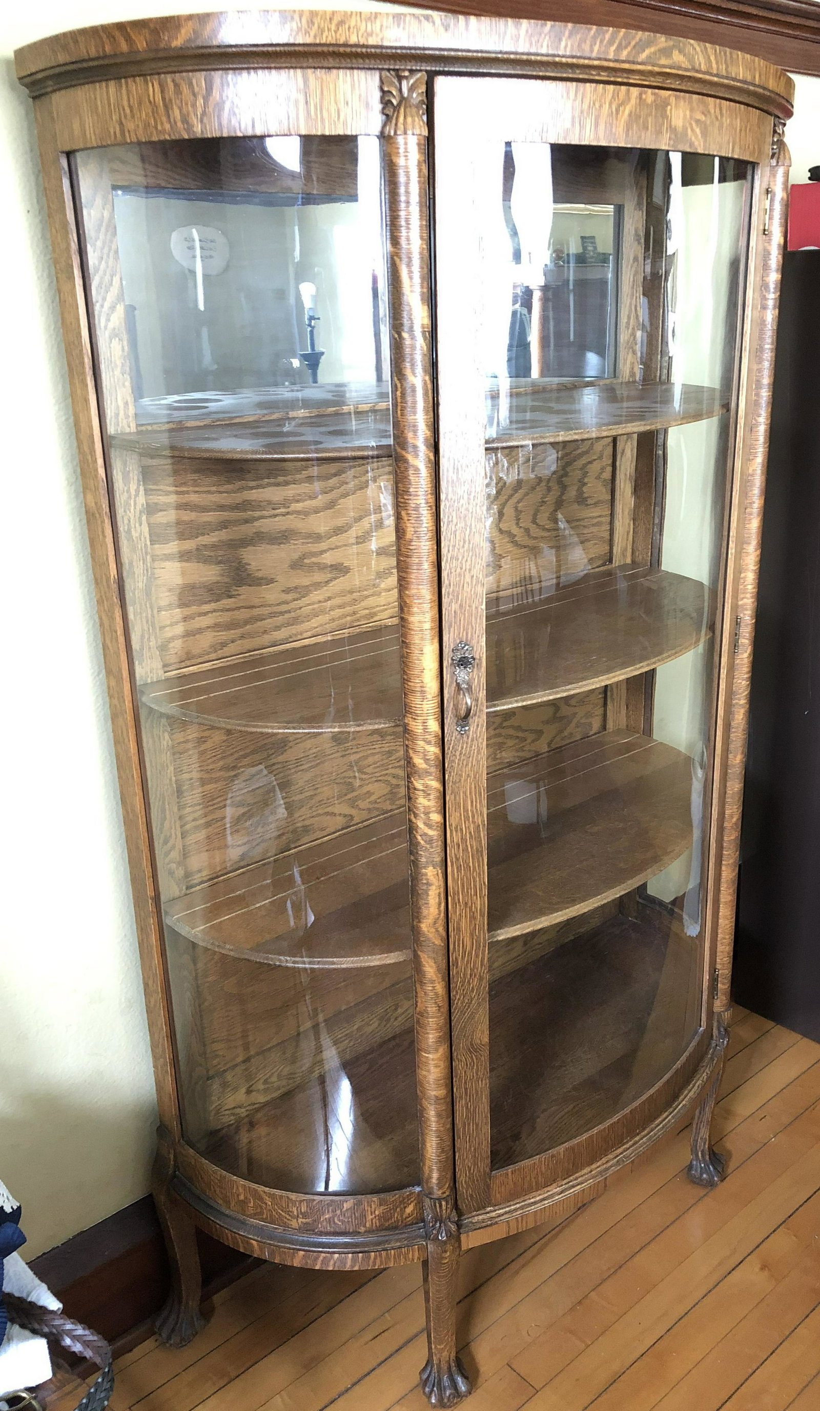 Antique Oak Curve glass China Cabinet: Claw feet, columns, all 3 glass are curved, mirror back