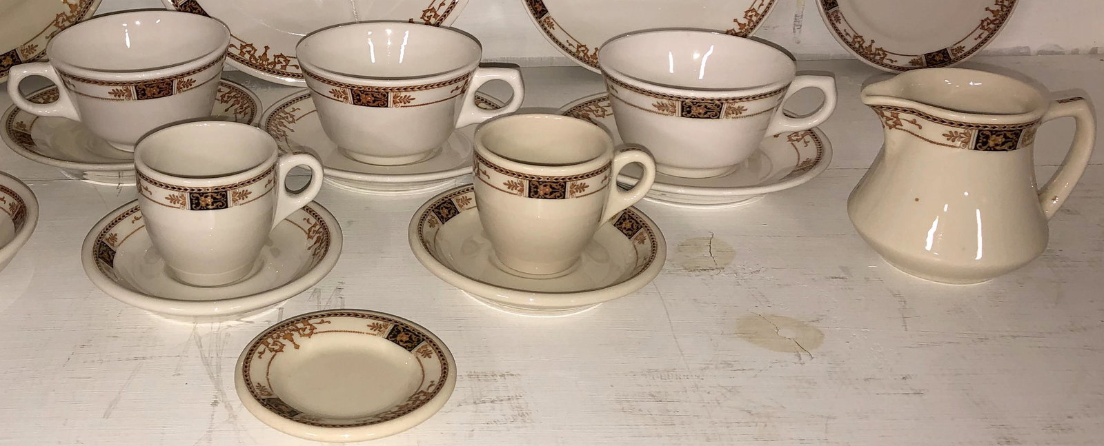 Fred Harvey RR China Old Ivory "Champlain": 3 coffe cups & saucers, 2 Demitasse cups & saucers, 1 butter pat, 1 - 5-1/2" plate, 1 creamer