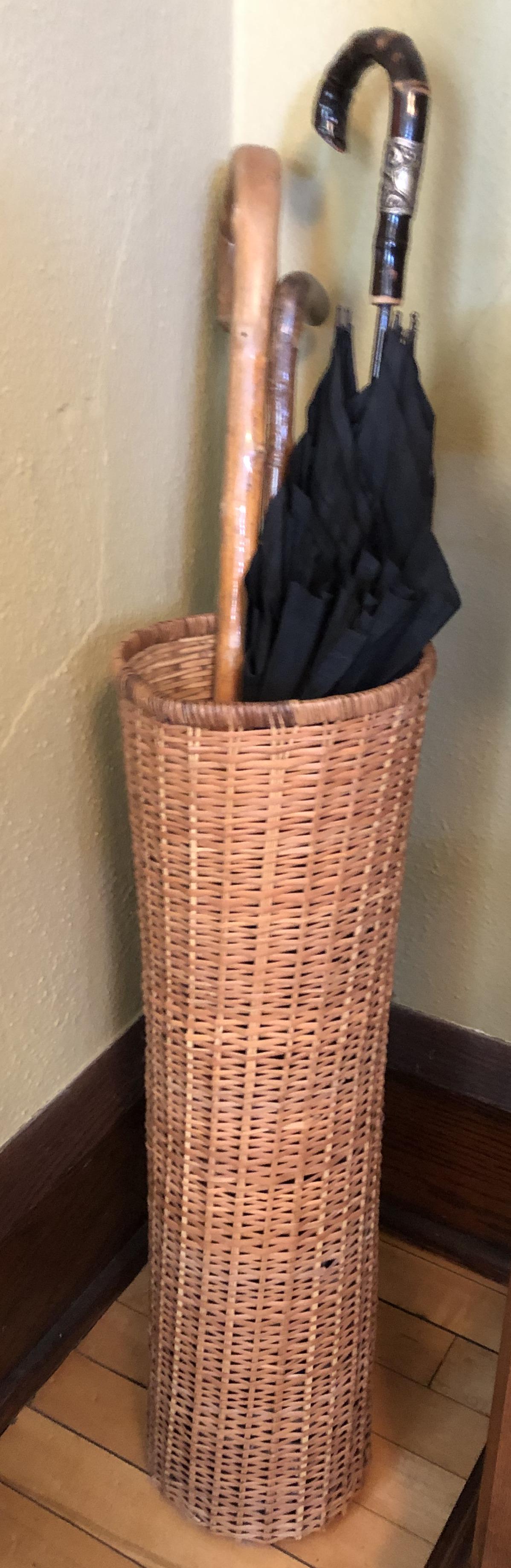 Whicker Umbrella Stand: Comes with a vintage umbrella, and 2 canes