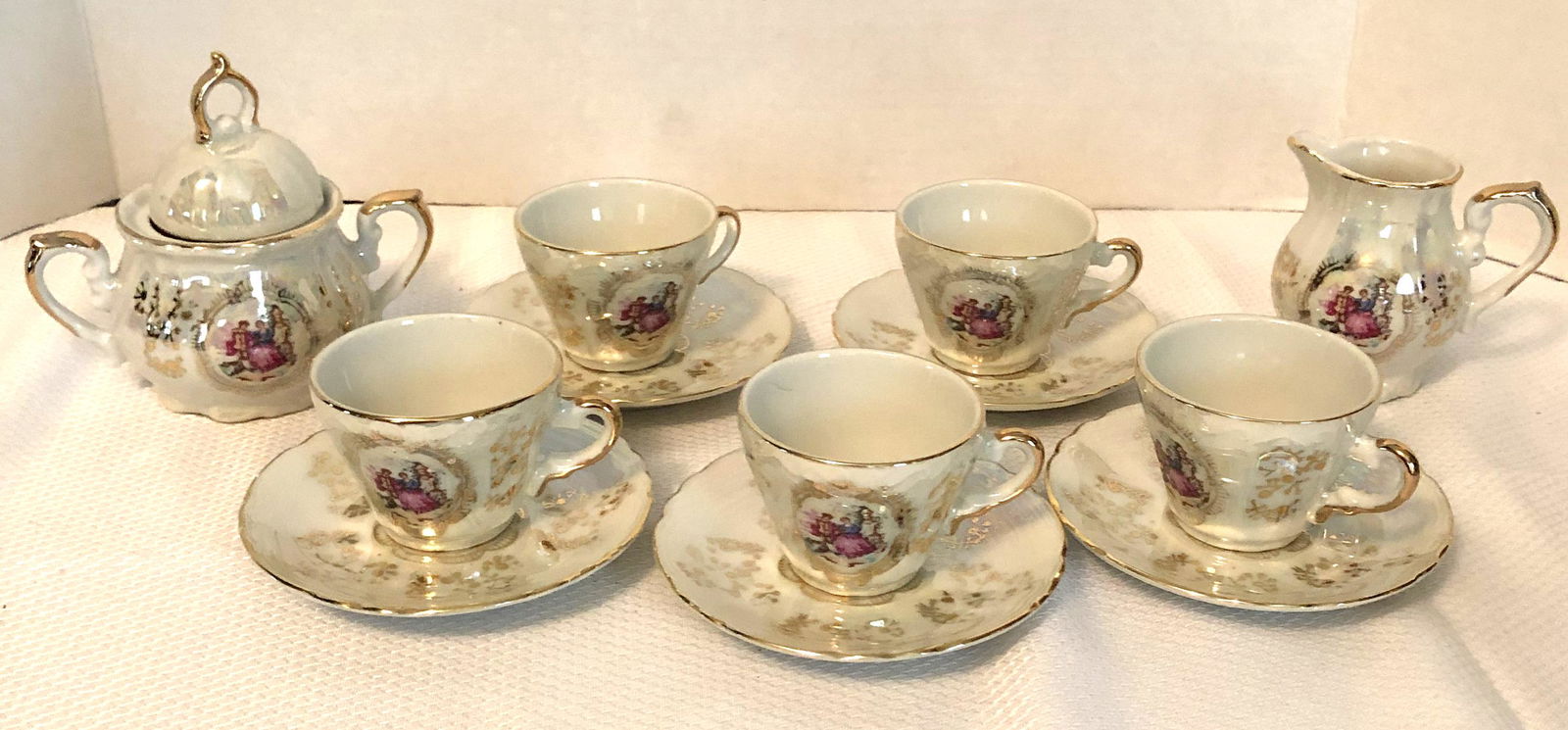Vintage partial tea set: Sugar lid appears to have been replaced with the tea pot lid, and tea pot is missing
